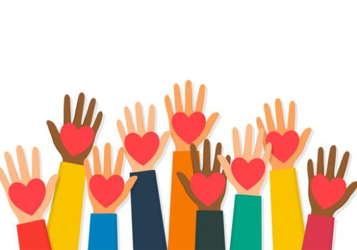 multiple hands holding hearts